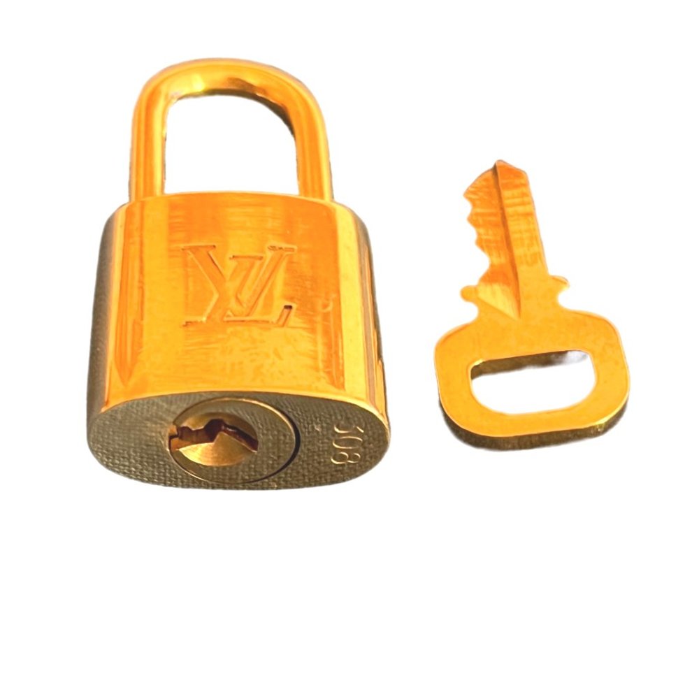 Small Brass Louis Vuitton Lock and Key Set. - Picture 6 of 10
